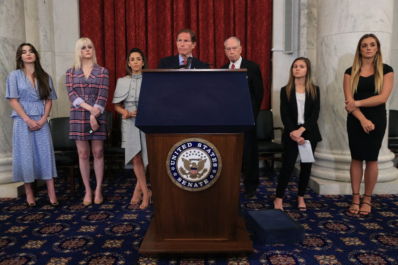  (L-R) Former U.S. Olympic gymnast McKayla Maroney, national champion Jessica Howard, Olympian Aly Raismam, Sen. Richard Blumenthal (D-CT), Sen. Charles Grassley (R-IA), gymnast Kaylee Lorincz and NCAA and world champion gymnast Maggie Nichols hold a news conference in the Russell Senate Office Building following the gymnasts' testimony before the Senate Judiciary Committee on September 15, 2021 in Washington, DC. Maroney, Raisman and Nichols testified about the abuse they experienced at the hands of Larry Nassar, the now-imprisoned U.S. women's national gymnastics team doctor, and the Federal Bureau of Investigation’s lack of urgency when handling their cases.
