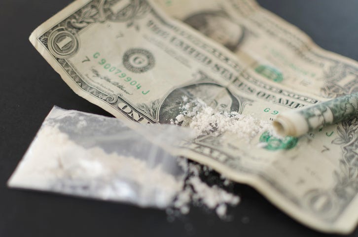 Cocaine and dollars.
