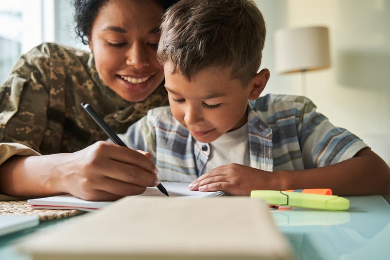 veteran helping child