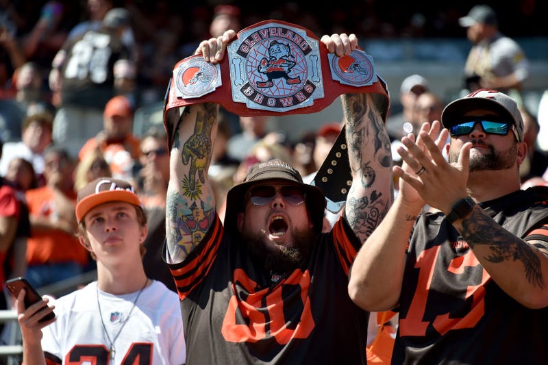 Browns fan holds up a wrestling belt