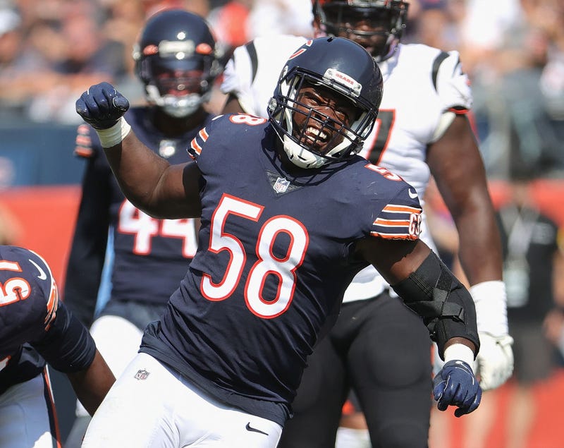Roquan Smith #58 of the Chicago Bears celebrates a sack against Joe Burrows of the Cincinnati Bengals at Soldier Field on September 19, 2021 in Chicago, Illinois. The Bears defeated the Bengals 20-17.
