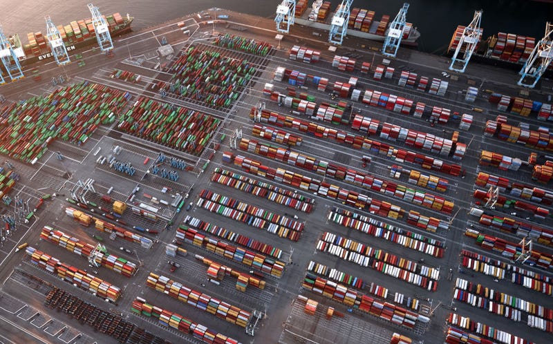 An aerial view of container ships and shipping containers at the Port of Los Angeles on September 20, 2021.