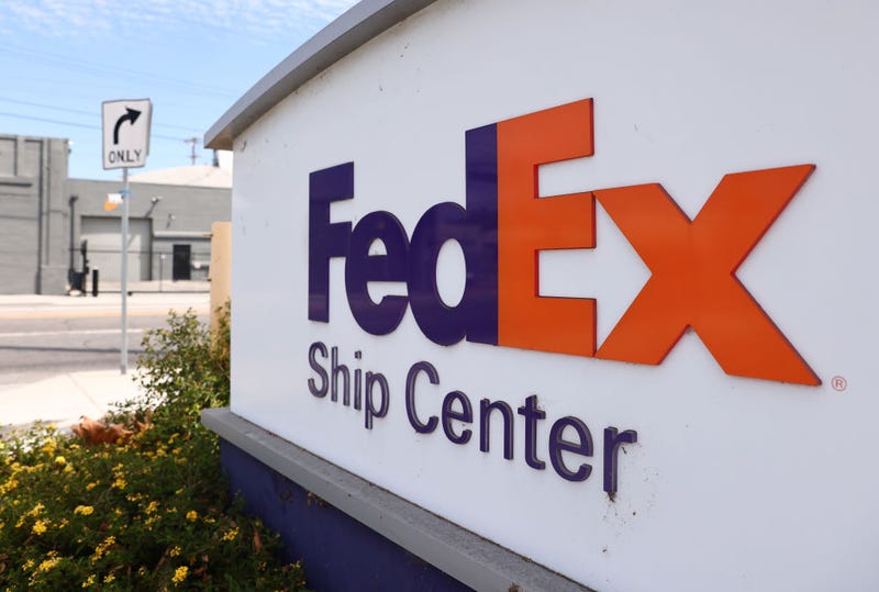 Mario Tama/Getty Images The FedEx logo is displayed at a FedEx Ship Center in Los Angeles.