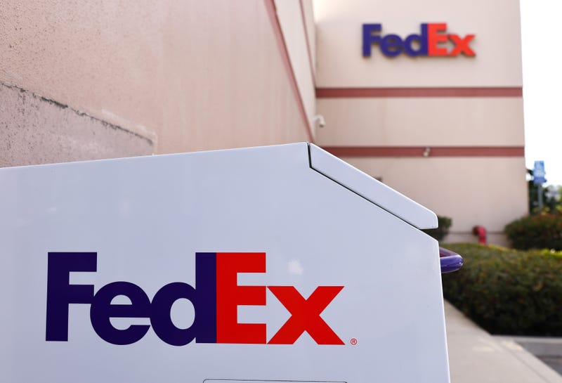 The FedEx logo is displayed at a FedEx Ship Center on September 22, 2021 in Los Angeles, California.