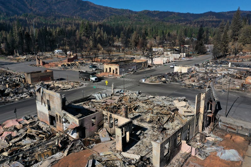 In an aerial view, the remains of homes and businesses that were destroyed by the Dixie Fire are visible on September 24, 2021 in Greenville, California.
