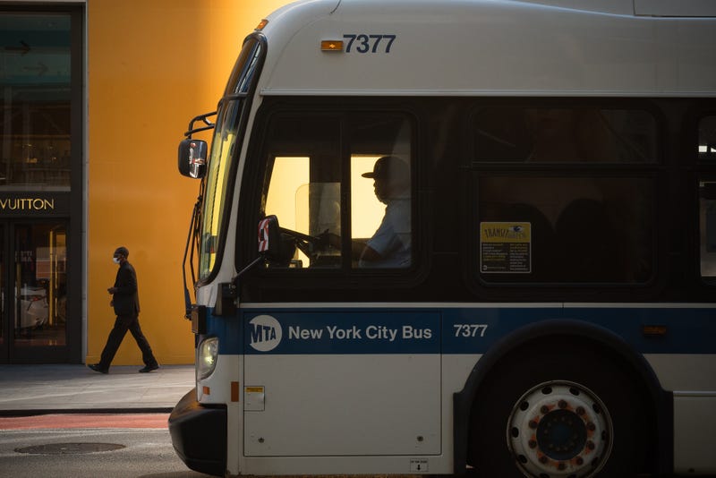 A 25-year-old man is recovering after being struck in the neck by a stray bullet while riding a Brooklyn bus.