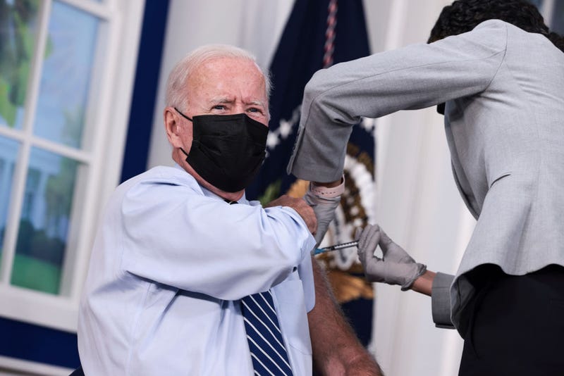President Joe Biden receives a third dose of the Pfizer/BioNTech Covid-19 vaccine in the South Court Auditorium in the White House September 27, 2021 in Washington, DC.