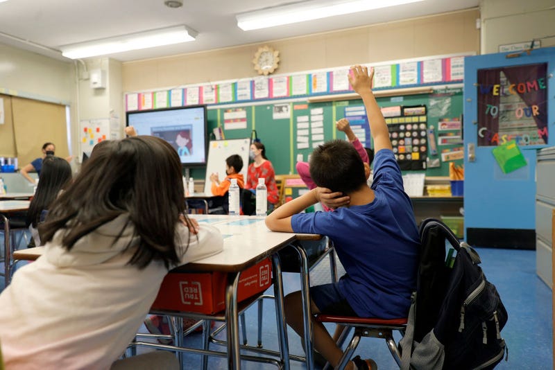 Teachers and students at the Yung Wing School P.S. 124 in Manhattan on September 27, 2021.