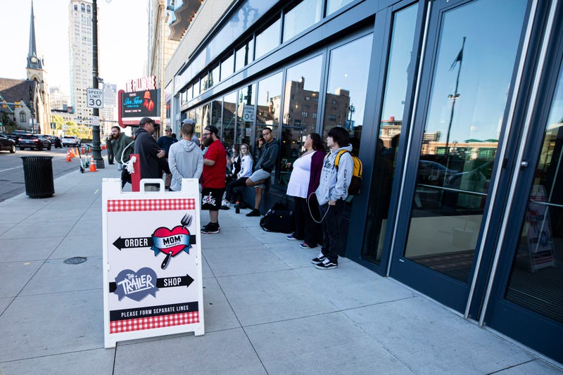 Fans wait in line on the opening night of Eminem's restaurant "Mom's Spaghetti" on September 29, 2021 in Detroit, Michigan.