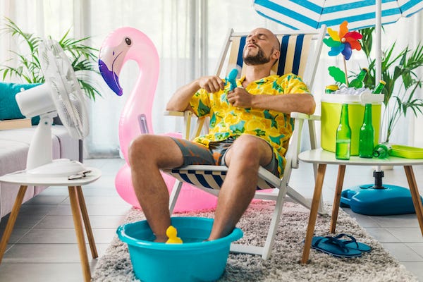 Man spending summer vacations at home