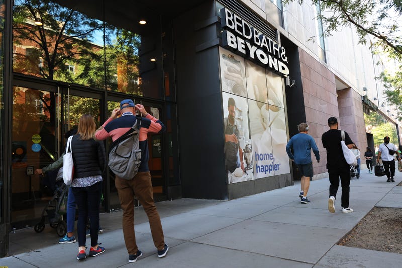 People walk past the Bed Bath & Beyond store in Tribeca, which is among the locations closing