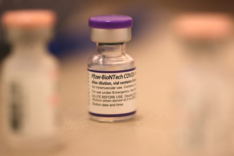 A vial of Pfizer COVID-19 booster vaccination sits on a table at a vaccination booster shot clinic on October 01, 2021 in San Rafael, California.