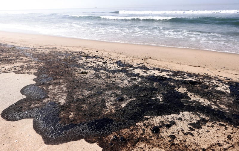 Oil is washed up on Huntington State Beach after a 126,000-gallon oil spill from an offshore oil platform on October 3, 2021.