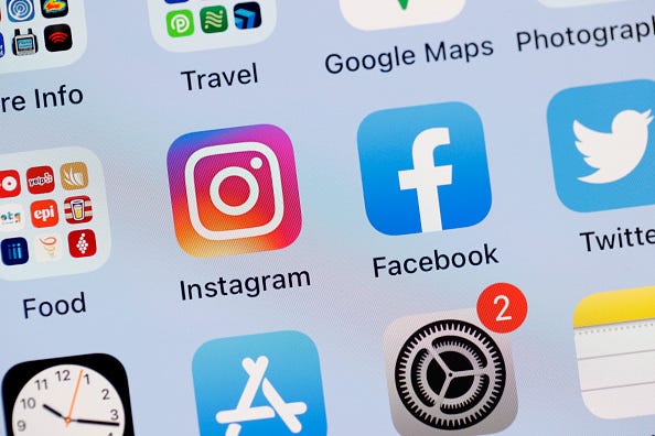 In this photo illustration, the Facebook and Instagram apps are seen on the screen of an iPhone on October 04, 2021 in San Anselmo, California. 