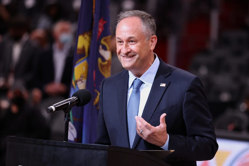 File photo: Doug Emhoff, husband of U.S. Vice President Kamala Harris, speaks at a naturalization ceremony for 16 people during halftime at a NBA preseason game between the San Antonio Spurs and Detroit Pistons at Little Caesars Arena on October 06, 2021 in Detroit, Michigan