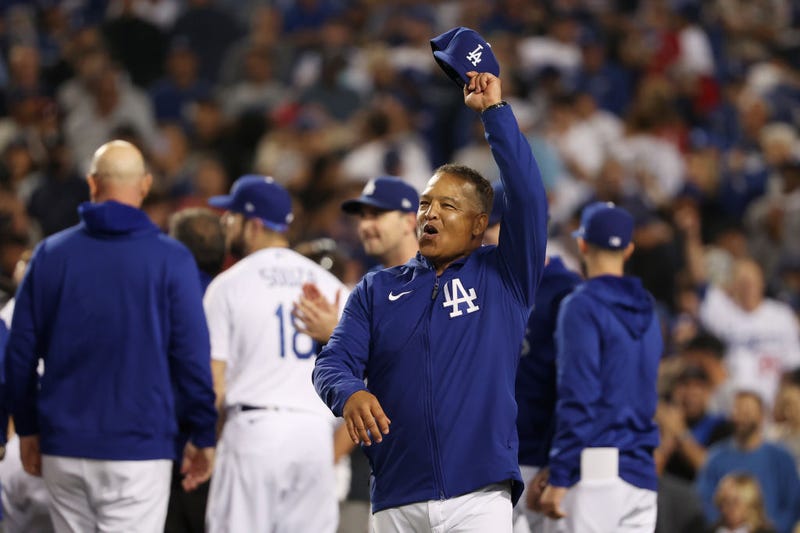 Dave Roberts #30 of the Los Angeles Dodgers celebrates their win over the St. Louis Cardinals on October 06, 2021 in Los Angeles, California