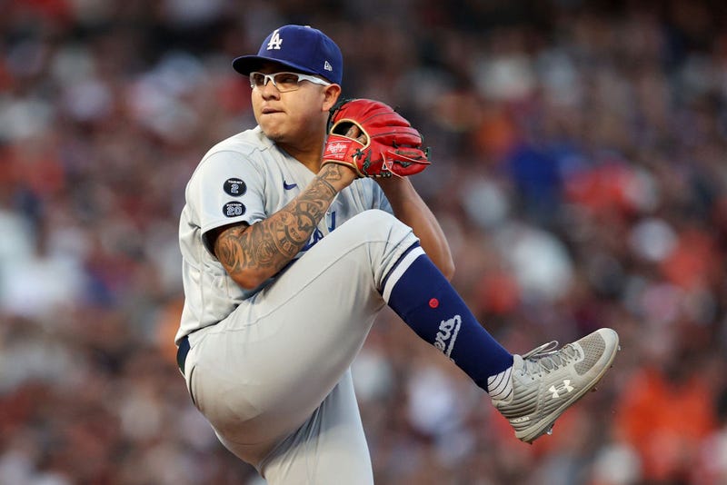 Julio Urias #7 of the Los Angeles Dodgers pitches in the first inning against the San Francisco Giants during Game 2 of the National League Division Series at Oracle Park.