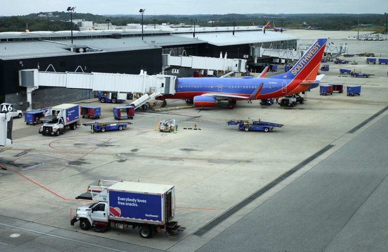 A Southwest Airlines airplane waits at a gate at Baltimore Washington International Thurgood Marshall Airport on October 11, 2021 in Baltimore, Maryland.