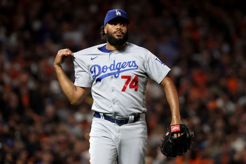 Kenley Jansen #74 of the Los Angeles Dodgers reacts against the San Francisco Giants during the eighth inning in game 5 of the National League Division Series.