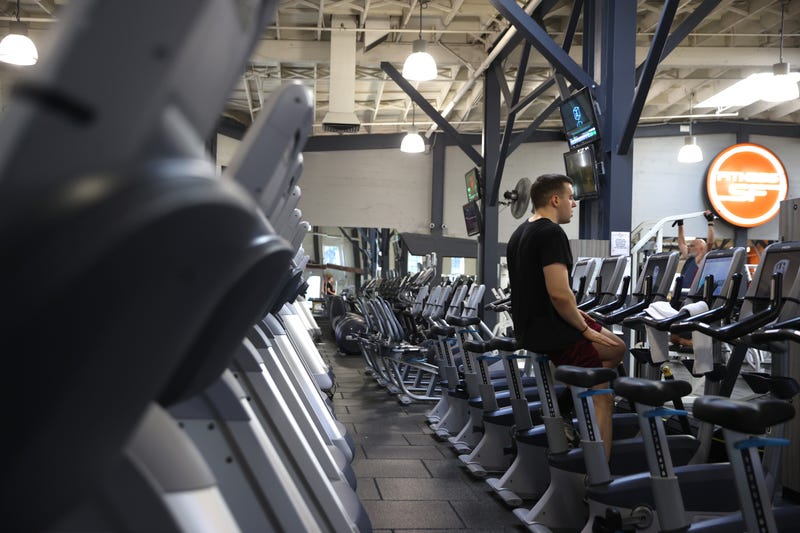 A Fitness SF customer rides a stationary bike without a face mask a Fitness SF gym on October 15, 2021 in San Francisco, California. 