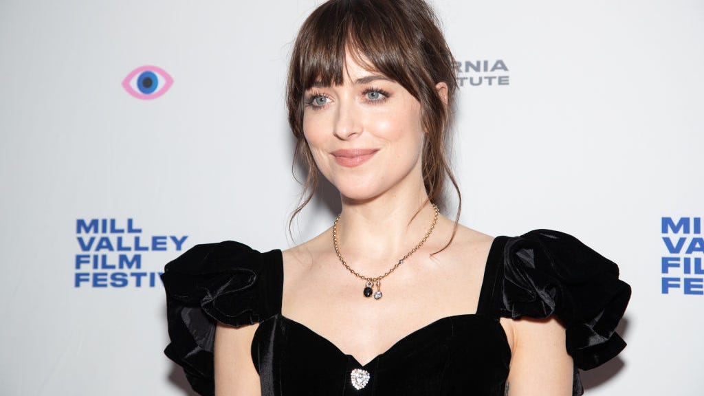 Dakota Johnson calls cancel culture a 'downer,' says she had 'incredible time' working with Johnny Depp, Armie Hammer