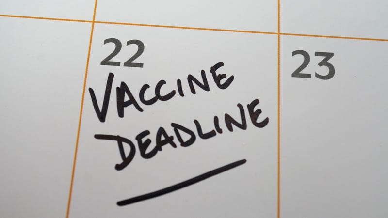 Vaccine deadline written on a calendar