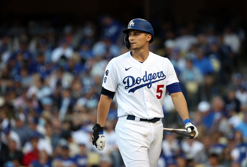  Corey Seager #5 of the Los Angeles Dodgers strikes out during the 7th inning of Game 3 of the National League Championship Series against the Atlanta Braves at Dodger Stadium on October 19, 2021 in Los Angeles, California. 