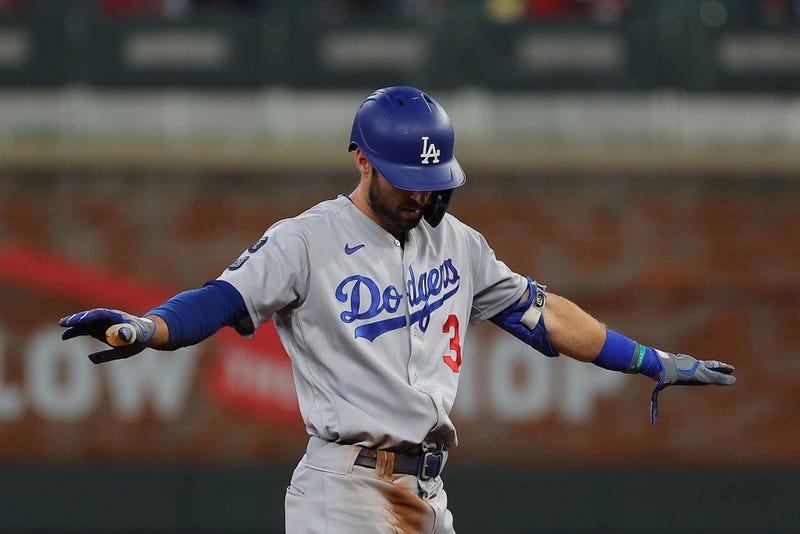 FILE - Chris Taylor #3 of the Los Angeles Dodgers reacts to a double during the seventh inning of Game Six of the National League Championship Series against the Atlanta Braves at Truist Park on October 23, 2021 in Atlanta, Georgia.