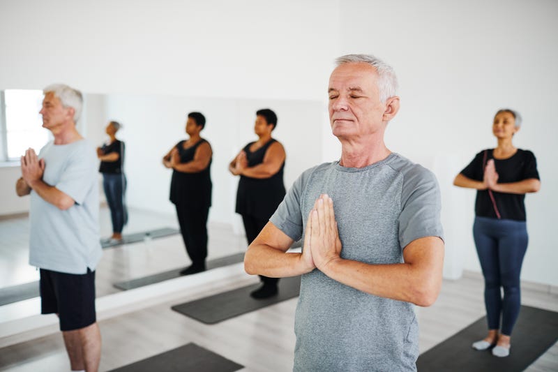 People meditating