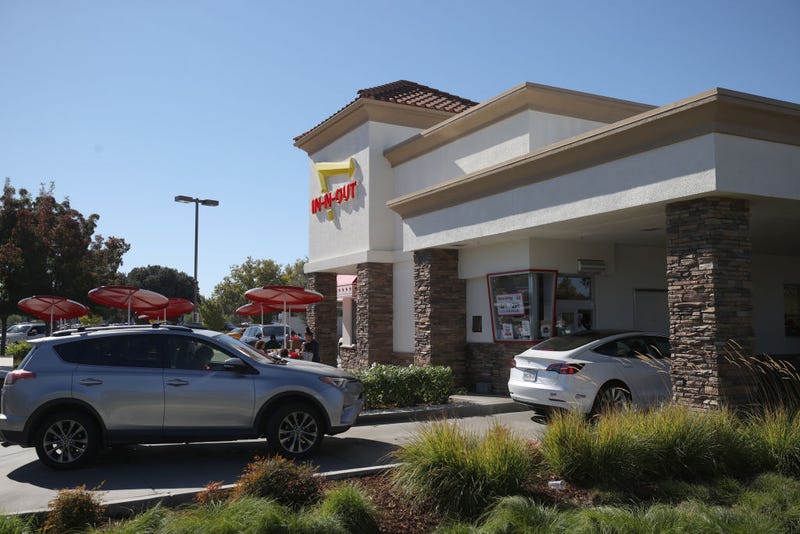 Cars line up in the drive thru at an In-n-Out restaurant on October 28, 2021 in Pleasant Hill, California.