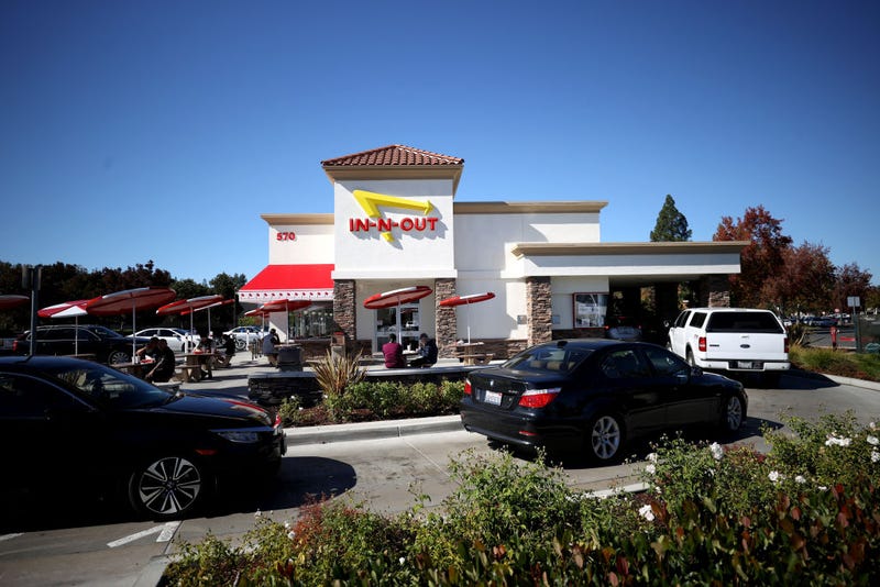Cars line up in the drive thru at an In-n-Out restaurant on October 28, 2021 in Pleasant Hill, California.