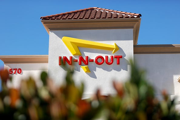 The In-n-Out logo is displayed on the front of an In-n-Out restaurant on October 28, 2021 in Pleasant Hill, California. 