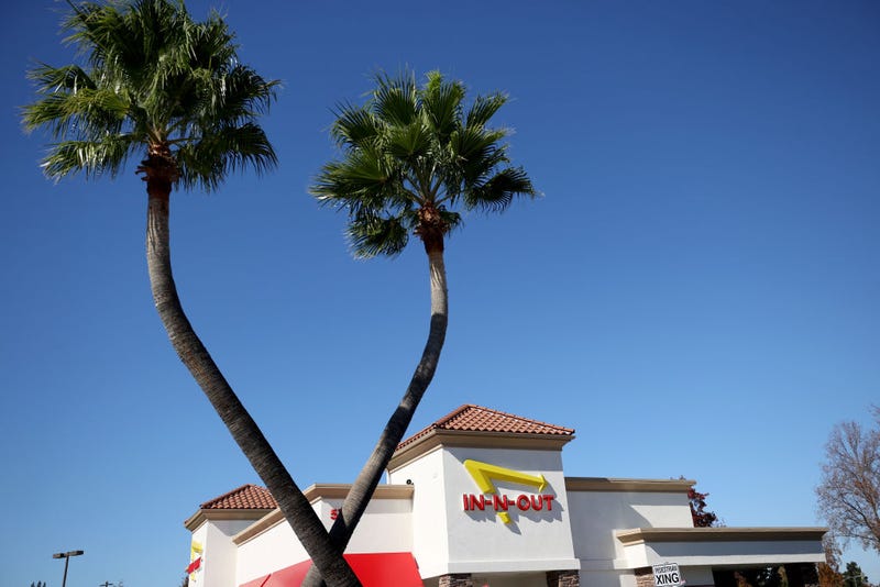 The In-n-Out logo is displayed on the front of an In-n-Out restaurant on October 28, 2021 in Pleasant Hill, California.