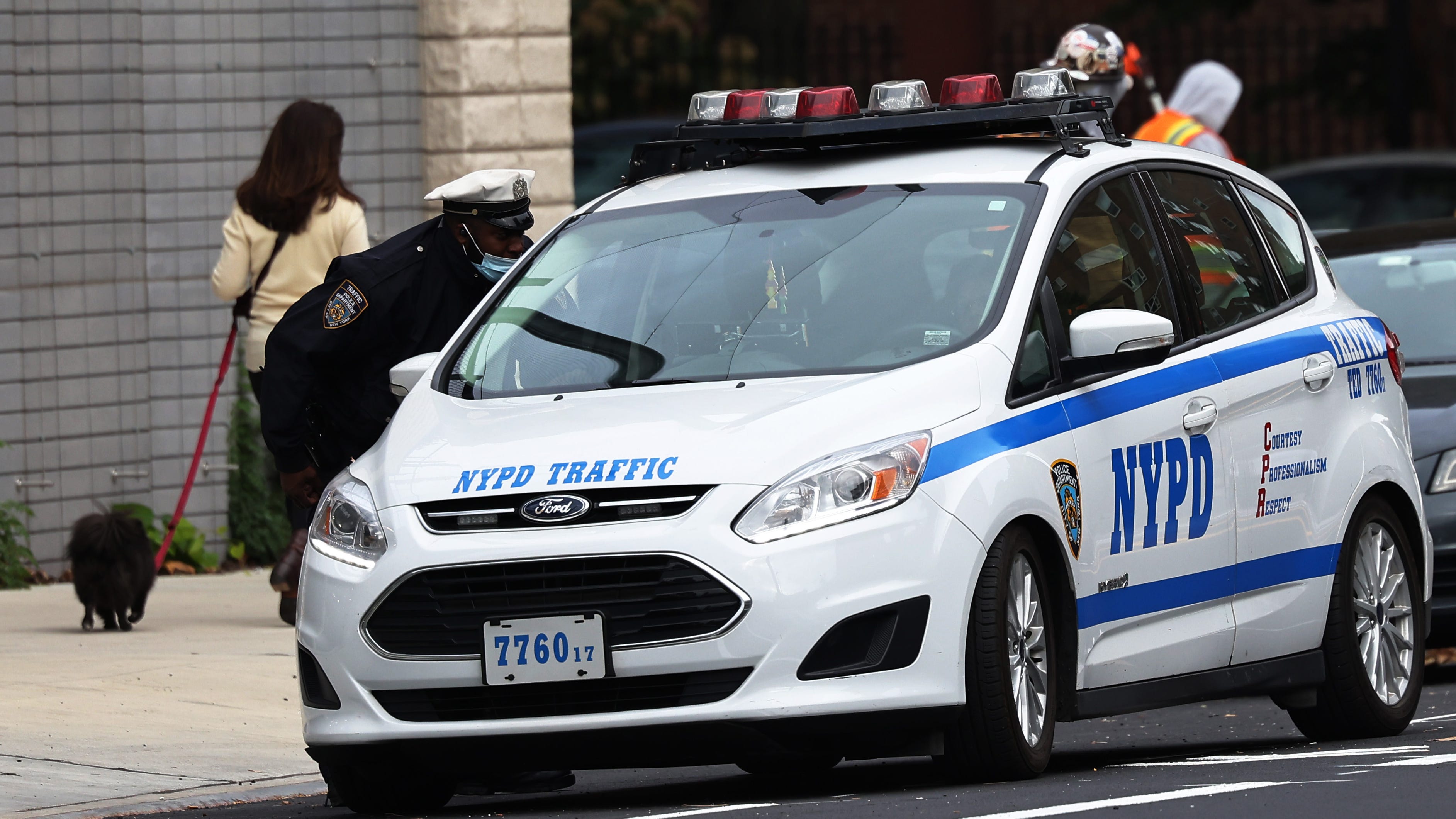 Off-duty NYPD traffic agent arrested on assault, robbery charges