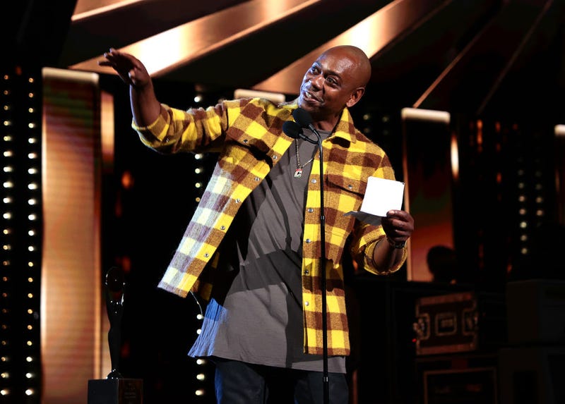 Dave Chappelle speaks onstage during the 36th Annual Rock & Roll Hall Of Fame Induction Ceremony at Rocket Mortgage Fieldhouse on October 30, 2021 in Cleveland, Ohio. (Photo by Dimitrios Kambouris/Getty Images for The Rock and Roll Hall of Fame )