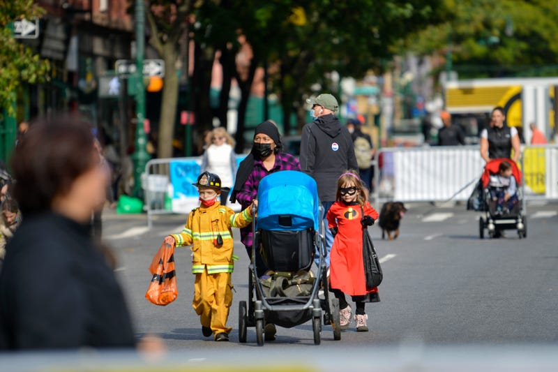 Families and children trick-or-treat on the Upper West Side on Oct. 31, 2021