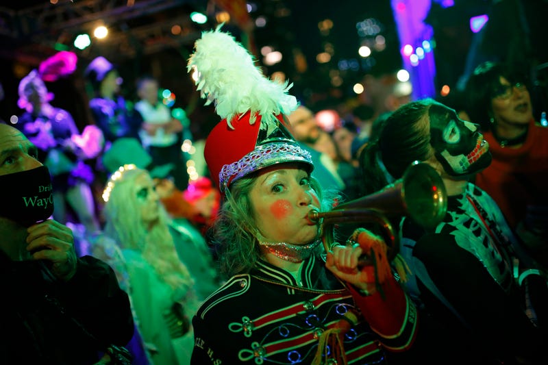 People participate in New York’s 48th Annual Village Halloween Parade in Greenwich Village on October 31, 2021 in New York City. The annual Halloween parade in Greenwich Village returned after being postponed last year due to the coronavirus (COVID-19) pandemic. 