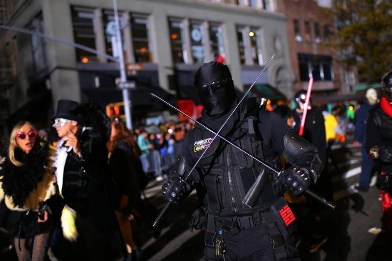 People participate in New York’s 48th Annual Village Halloween Parade in Greenwich Village on October 31, 2021 in New York City. The annual Halloween parade in Greenwich Village returned after being postponed last year due to the coronavirus (COVID-19) pandemic.