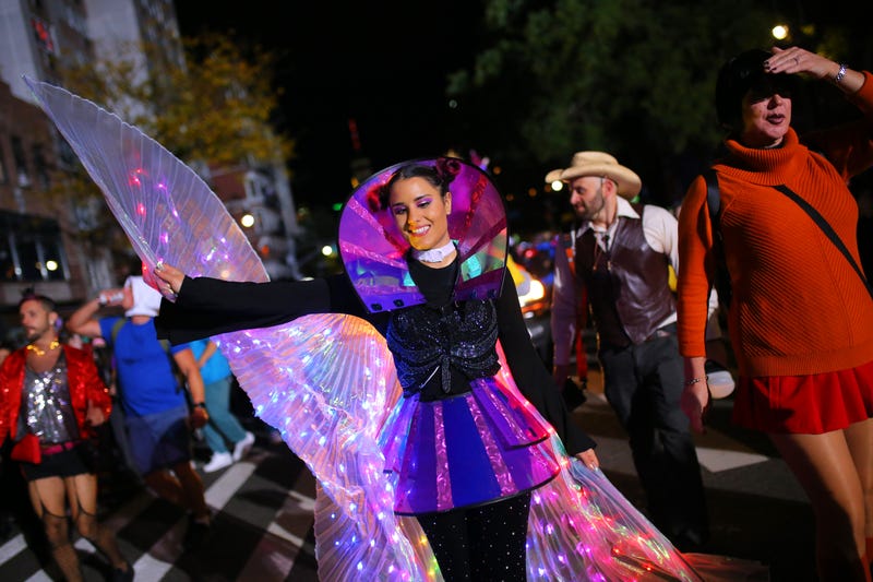 People participate in New York’s 48th Annual Village Halloween Parade in Greenwich Village on October 31, 2021 in New York City. The annual Halloween parade in Greenwich Village returned after being postponed last year due to the coronavirus (COVID-19) pandemic.