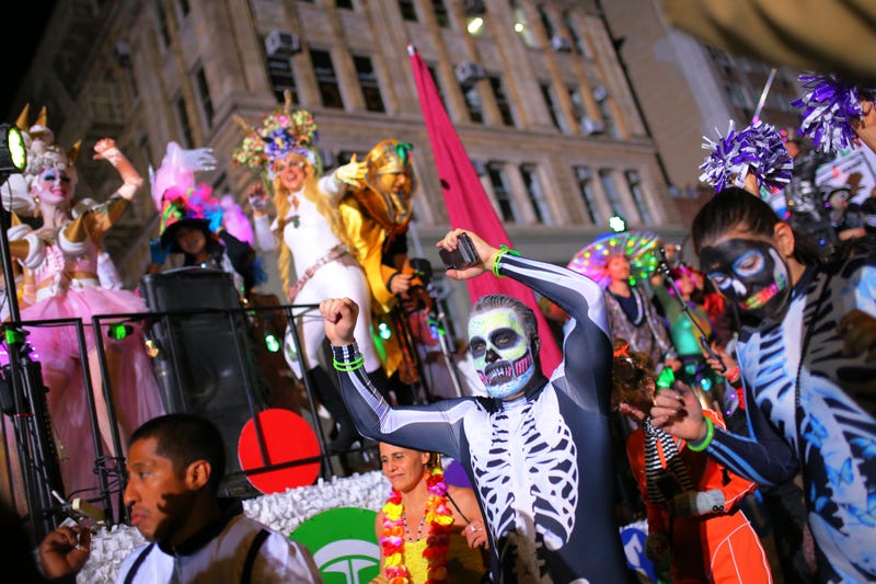 People participate in New York’s 48th Annual Village Halloween Parade in Greenwich Village on October 31, 2021 in New York City. The annual Halloween parade in Greenwich Village returned after being postponed last year due to the coronavirus (COVID-19) pandemic.