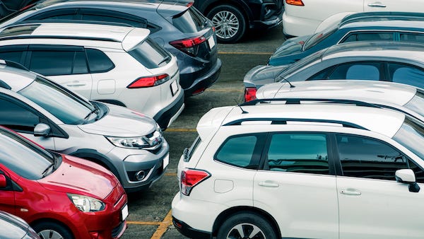 American cars and trucks are quickly becoming too big for normal parking spaces