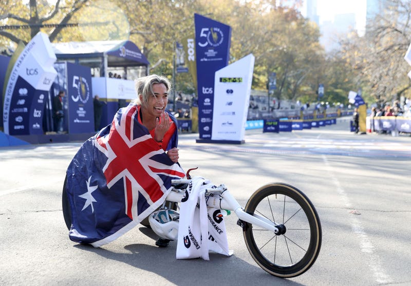 Madison De Rozario of Australia pauses after the finish line after she won the Women's Wheelchair division during the 2021 TCS New York City Marathon in Central Park on November 07, 2021 in New York City.