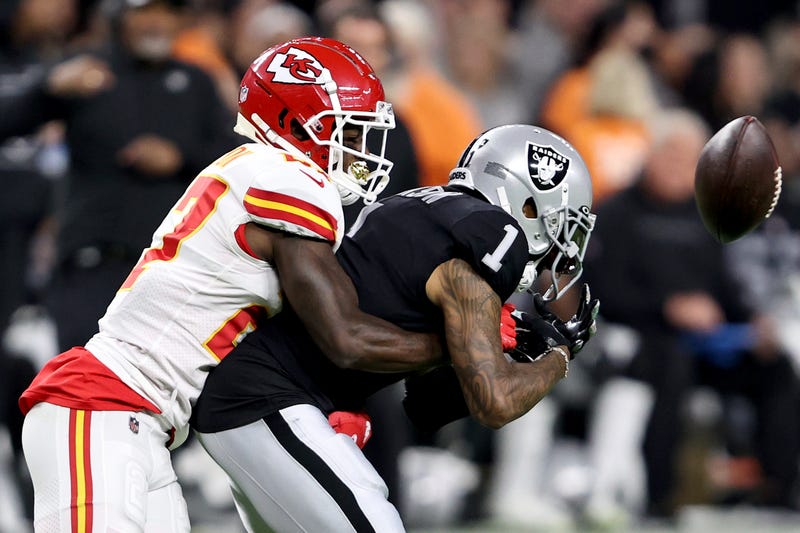 Rashad Fenton #27 of the Kansas City Chiefs strips DeSean Jackson #1 of the Las Vegas Raiders for a fumble during the second half in the game at Allegiant Stadium on November 14, 2021