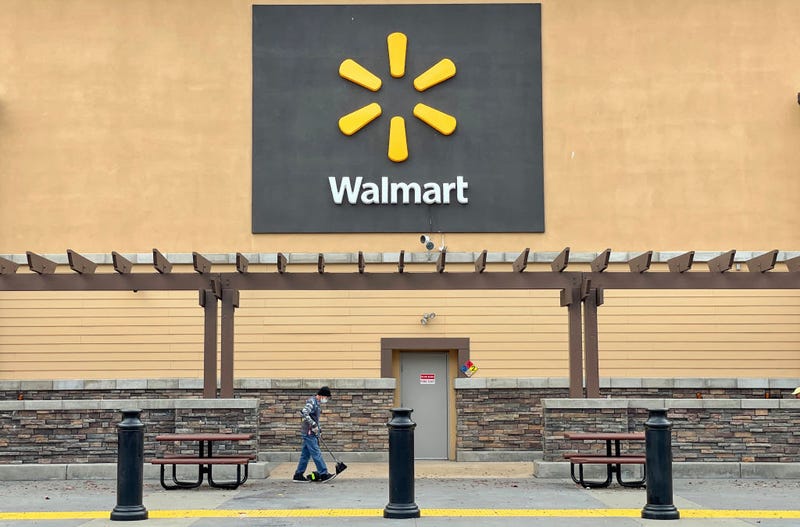 A sign is posted in front of a Walmart store on November 16, 2021 in American Canyon, California. 