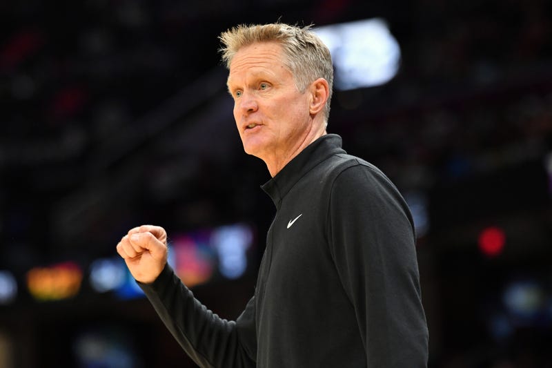 Head Coach Steve Kerr of the Golden State Warriors communicates with his players during the second half against the Cleveland Cavaliers at Rocket Mortgage Fieldhouse on November 18, 2021 in Cleveland, Ohio. 