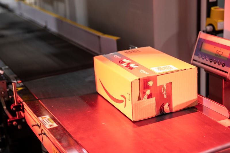 A package is scanned at an Amazon warehouse.