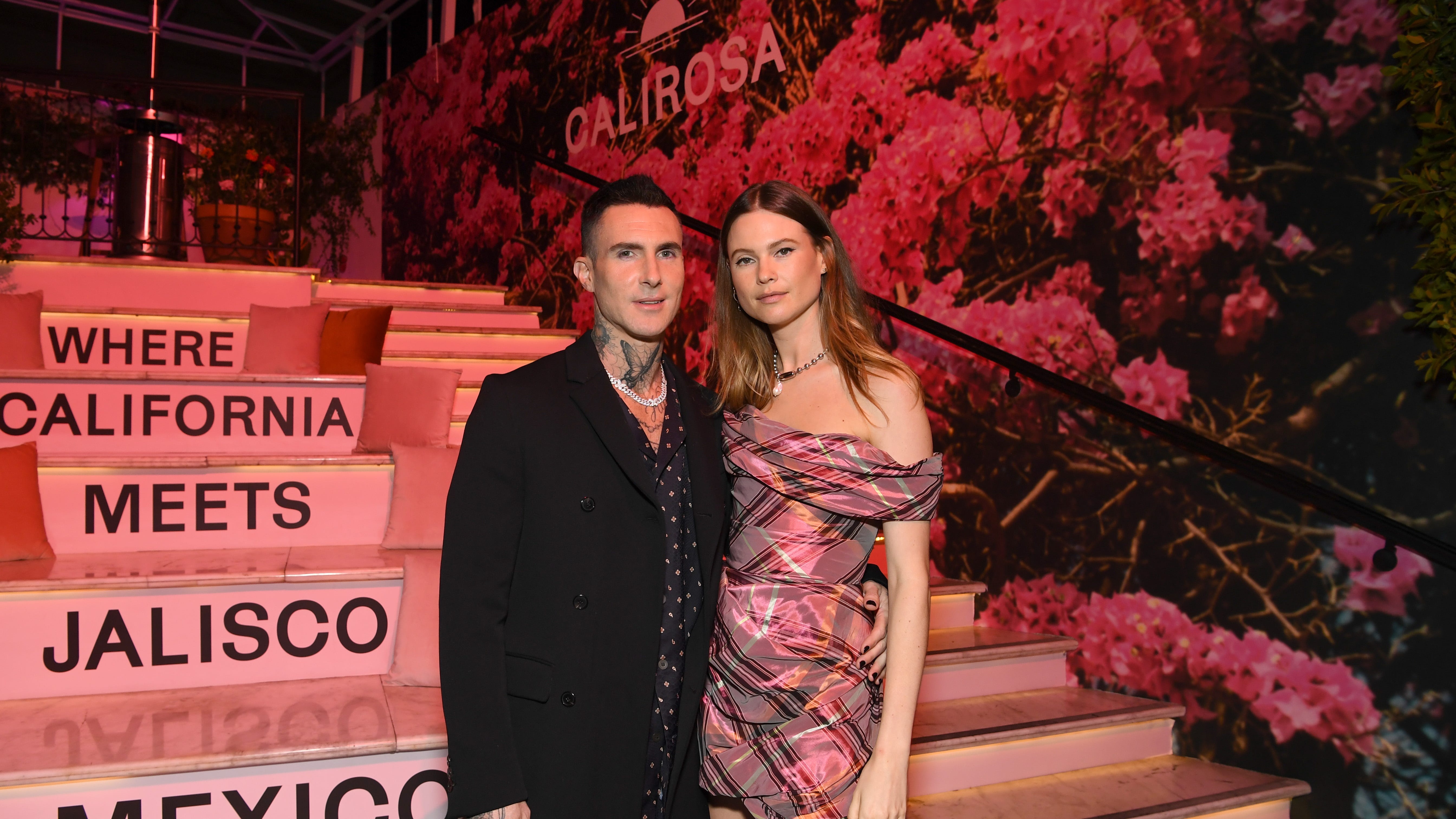 Adam Levine showed off his new face tattoo while partying at Art Basel with Behati Prinsloo