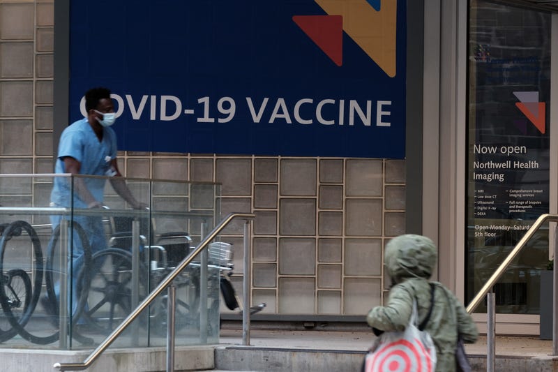 A sign outside a New York City hospital advertises the COVID-19 vaccine