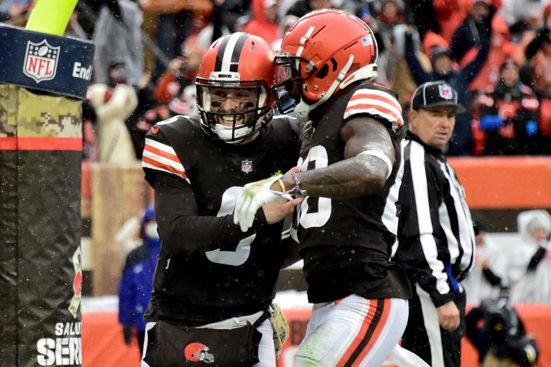 Baker Mayfield and Jarvis Landry celebrate after Landry scored a rushing touchdown in the second quarter against the Detroit Lions