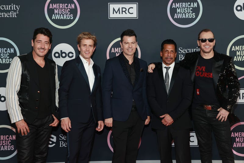 (L-R) Jonathan Knight, Joey McIntyre, Jordan Knight, Danny Wood, and Donnie Wahlberg of New Kids on the Block attend the 2021 American Music Awards at Microsoft Theater on November 21, 2021 in Los Angeles, California.